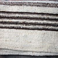 Fyassà (épaisse couverture en laine tissée d'un seul tenant)